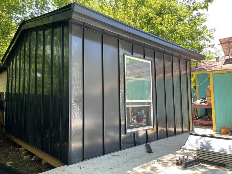 Black standing seam metal wall panels for Roof Inspection in Mendota Heights