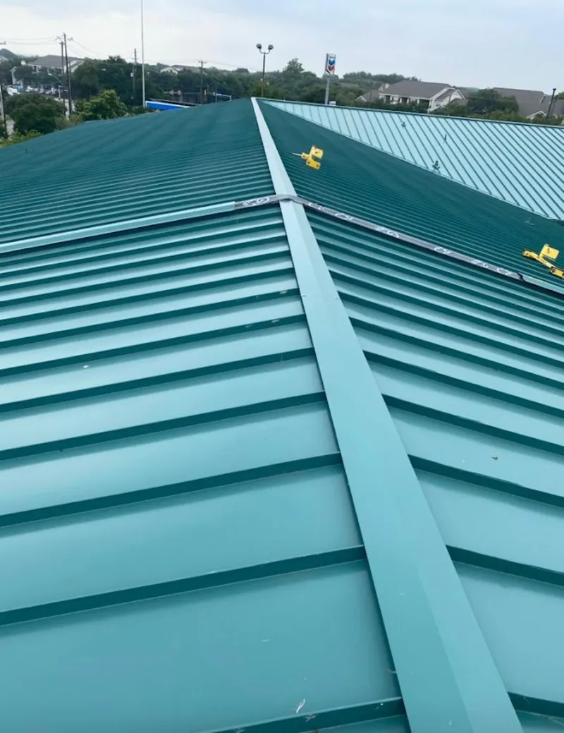Green commercial metal roof ridge and valley for Metal Roof Repair in Mendota Heights